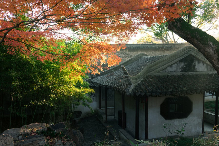 Garden buildings and autumn foliage at the Lingering Garden in Suzhou.