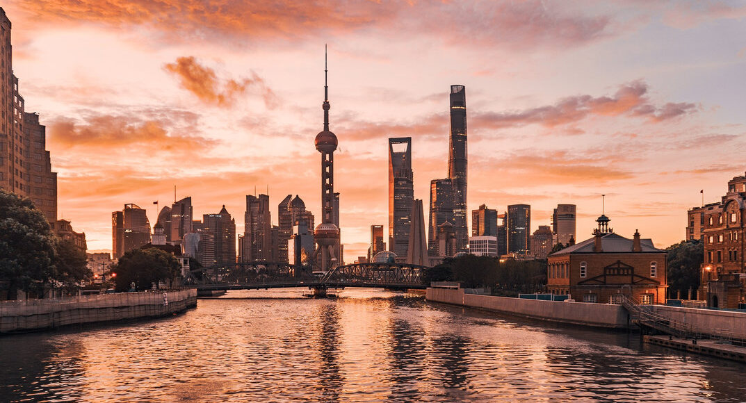 Lujiazui skyline glowing at sunset in Shanghai