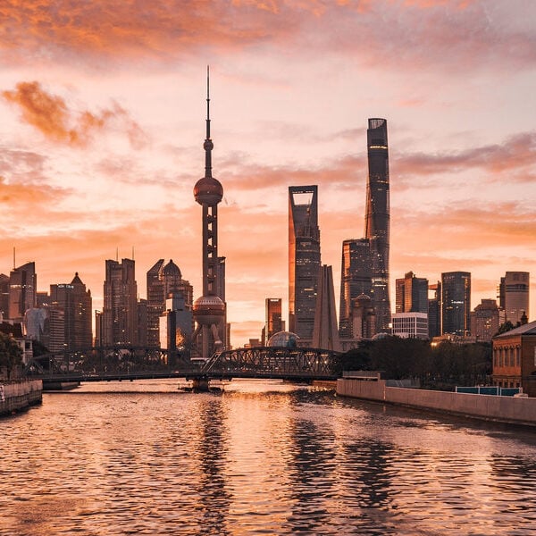 Lujiazui skyline glowing at sunset in Shanghai