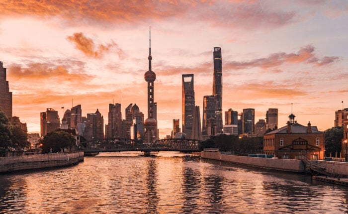 Lujiazui skyline glowing at sunset in Shanghai