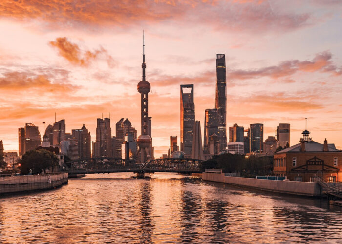 Lujiazui skyline glowing at sunset in Shanghai