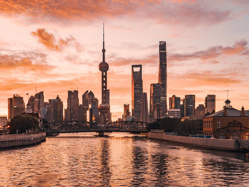 Lujiazui skyline glowing at sunset in Shanghai