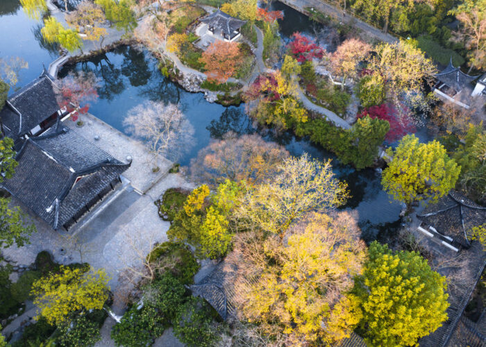 Garden buildings among autumn trees at the Humble Administrator’s Garden in Suzhou.