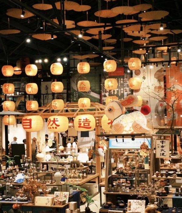 Lanterns, bamboo parasols and handmade objects inside Ziran Zaowu in Pingyao, Hangzhou