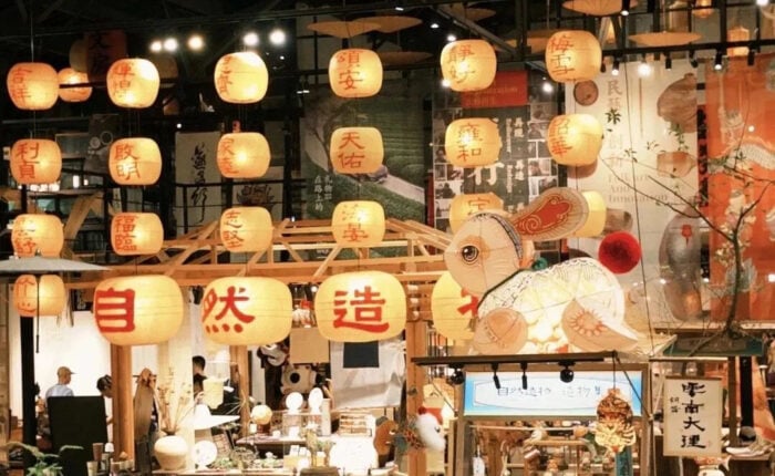 Lanterns, bamboo parasols and handmade objects inside Ziran Zaowu in Pingyao, Hangzhou