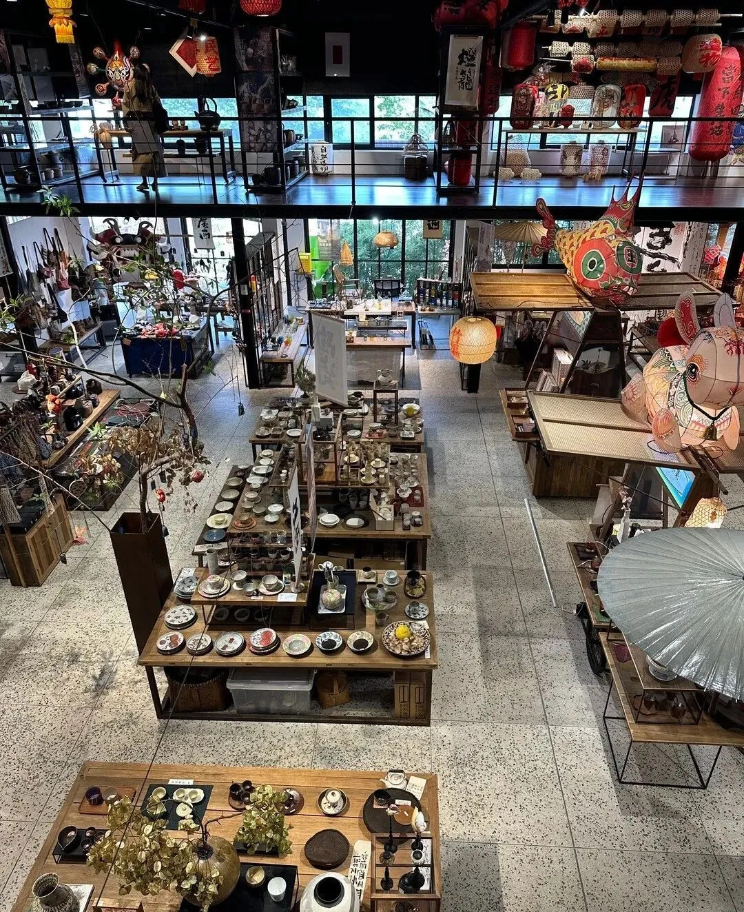 Tables of handmade ceramics and homeware in the folk craft centre