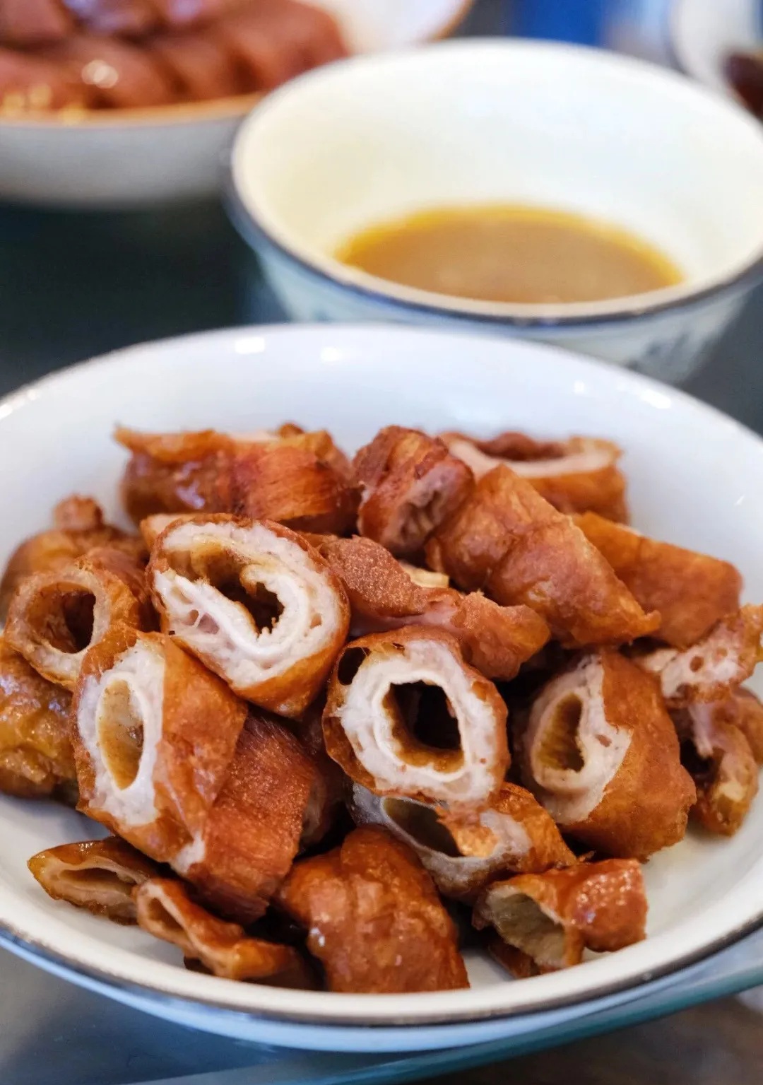 Crispy pork intestines served at Fu Yuan Ju in Hangzhou